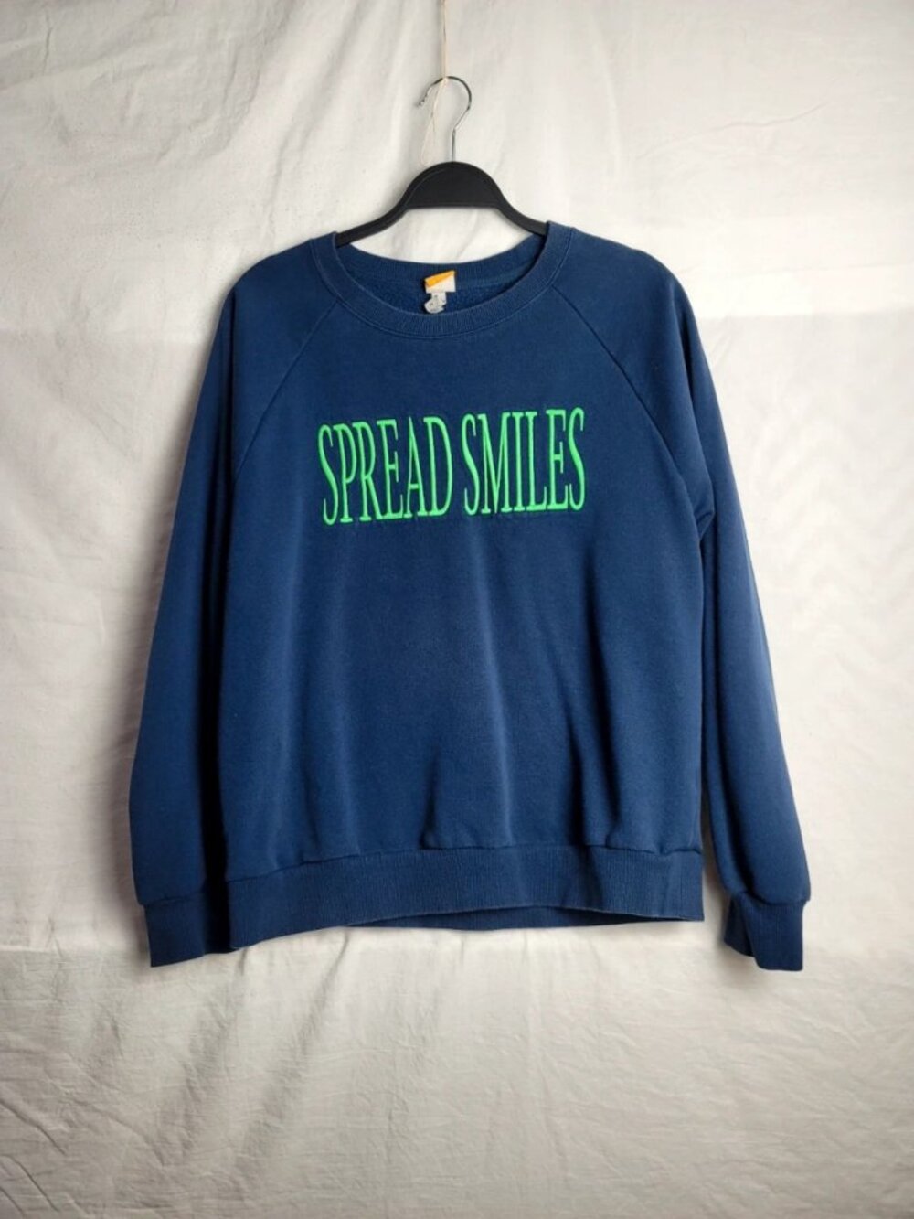 Women’s Navy Blue Fleece Crewneck Sweatshirt with Green “Spread Smiles”